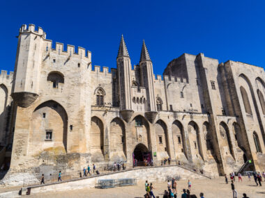 AVIGNON, FRANCE - JUNE 15, 2016: Papal palace in Avignon in a beautiful summer day, France on June 15, 2016