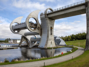 The Falkirk Wheel is a rotating boat lift in Falkirk, Scotland, connecting the Forth and Clyde Canal with the Union Canal.