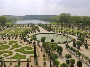 VERSAILLES, PARIS / FRANCE - MAY 05, 2017: The famous gardens of the Royal Palace of Versailles.